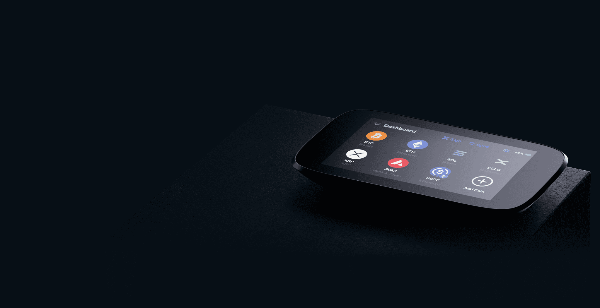 NGRAVE ZERO lying on a dark surface with its coin dashboard on screen