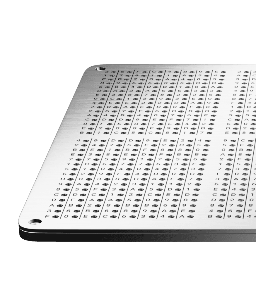 Close-up of a GRAPHENE steel plate with its punched grid of characters